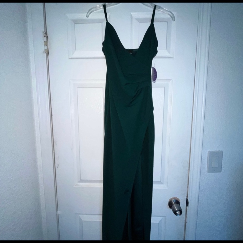 brand new NEVER worn dress bought
form a store called Windsor.